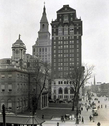 Hartford Trust Company building at 750 Main Street, circa 1936. Traveler's Tower in background, Old Statehouse at middle left. Isle of Safety in Foreground.