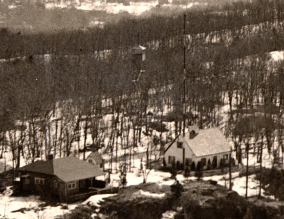 Closeup of W1XSL transmitter building and tower