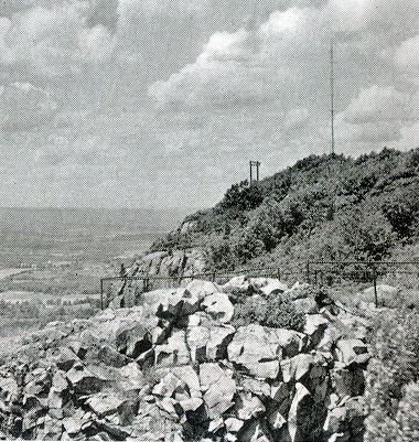 At left of antenna are terminals for telephone and utility lines