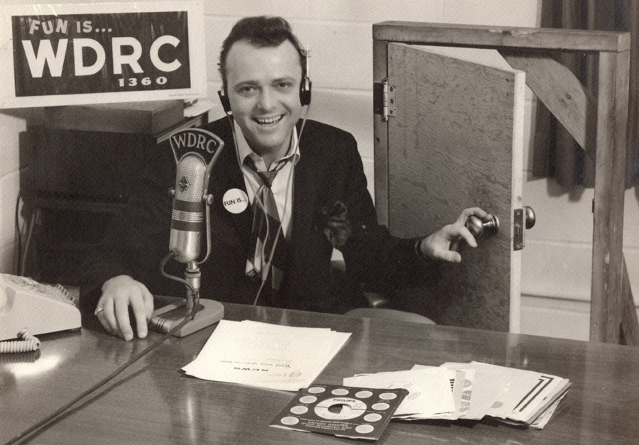 Ron Landry at work at WDRC in 1965; note his hand-made door-slamming machine.