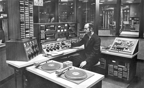 Chief Engineer George Watson sits at master control in WDRC's 15th floor studios at 750 Main Street, circa 1970.