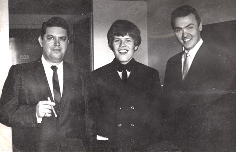 WPOP's Kilroy with Herman's Hermits lead singer Peter Noone and WPOP's Roy Cooper.